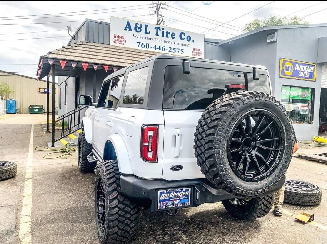 back shot of white offroad suv